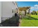 Backyard showcasing pergola covered patio area, perfect for outdoor dining and relaxation at 14162 Nicholas Dr, Carmel, IN 46074
