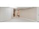 Open basement featuring neutral walls and plush carpet, leading to the finished living space at 14162 Nicholas Dr, Carmel, IN 46074