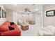 Finished basement featuring a sofa, chair, and wood storage box at 14162 Nicholas Dr, Carmel, IN 46074
