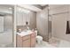 Bathroom featuring a single sink vanity with updated fixtures and a walk-in shower at 14162 Nicholas Dr, Carmel, IN 46074