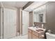 Bathroom featuring a single sink vanity with an updated mirror, offering ample lighting and storage at 14162 Nicholas Dr, Carmel, IN 46074