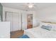 Well lit bedroom featuring closet, bed, and bathroom through doorway at 14162 Nicholas Dr, Carmel, IN 46074