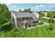 Charming two-story brick home with manicured lawn and landscaping at 14162 Nicholas Dr, Carmel, IN 46074