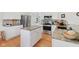Modern kitchen featuring stainless steel appliances, granite counters and an island with plenty of storage space at 14162 Nicholas Dr, Carmel, IN 46074