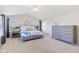Spacious main bedroom featuring large windows, neutral decor, and carpet flooring at 14162 Nicholas Dr, Carmel, IN 46074