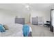 Bright main bedroom with cathedral ceiling, neutral decor, and carpet flooring at 14162 Nicholas Dr, Carmel, IN 46074