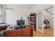 Well-lit home office featuring hardwood floors, neutral walls, and functional furniture for a productive workspace at 14162 Nicholas Dr, Carmel, IN 46074