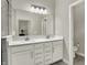Elegant bathroom featuring a double sink vanity, modern fixtures, and a seamless transition to an adjoining space at 15004 Stonneger St, Westfield, IN 46074