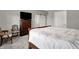 Bedroom boasts neutral decor, creating a serene atmosphere with furniture, television and ensuite bathroom access at 15004 Stonneger St, Westfield, IN 46074