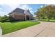 Exterior of community clubhouse with brick facade, manicured lawn, and inviting walkway at 1508 Redwood Dr, Carmel, IN 46032