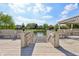 Community deck with a lake view featuring wooden railings and stairs at 1508 Redwood Dr, Carmel, IN 46032