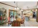 Spacious eat-in kitchen with updated appliances, an island, and glass doors to the exterior at 1508 Redwood Dr, Carmel, IN 46032