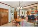 Open concept living room with hardwood floors that transitions into a carpeted sitting room at 1508 Redwood Dr, Carmel, IN 46032