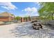Community pool area featuring a picnic area with tables and a pool with black fencing at 1508 Redwood Dr, Carmel, IN 46032