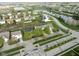 Neighborhood aerial view showcasing ponds and green spaces amid residential properties at 17060 Kingsbridge Blvd, Westfield, IN 46074