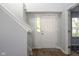 Bright foyer featuring wood flooring and a staircase at 17060 Kingsbridge Blvd, Westfield, IN 46074