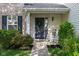 Inviting front entrance with a decorative wreath and rocking chairs at 17060 Kingsbridge Blvd, Westfield, IN 46074
