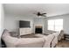 Comfortable living room with a fireplace and neutral decor at 17060 Kingsbridge Blvd, Westfield, IN 46074