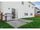The house has a walk-out patio, stainless steel grill, and well-maintained grassy backyard at 17060 Kingsbridge Blvd, Westfield, IN 46074