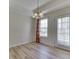 Dining area with a view outside, decorative chandelier and curtains at 1858 Jenny Dr, Martinsville, IN 46151