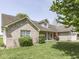 Well-maintained home featuring a manicured lawn and an inviting facade, creating a welcoming curb appeal at 1858 Jenny Dr, Martinsville, IN 46151