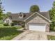 Charming single-story home with brick accents, a two-car garage, and well-maintained landscaping at 1858 Jenny Dr, Martinsville, IN 46151