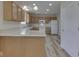 Bright eat-in kitchen with white appliances and light-colored flooring at 1858 Jenny Dr, Martinsville, IN 46151
