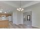 Open-concept kitchen with modern appliances and view into the living room at 1858 Jenny Dr, Martinsville, IN 46151