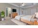 Bright main bedroom featuring neutral colors, plush rug, and ensuite bathroom at 1858 Jenny Dr, Martinsville, IN 46151