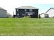 Expansive backyard with a patio area, offering plenty of room for outdoor activities and enjoying the serene surroundings at 2075 Longford Ln, Avon, IN 46123