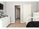 Cozy bedroom with neutral walls and carpet, featuring classic white dressers and decor at 2075 Longford Ln, Avon, IN 46123