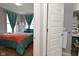 Comfortable bedroom with large windows and curtains, viewed from doorway to ensuite bathroom at 2075 Longford Ln, Avon, IN 46123