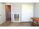 Neutral bedroom offers a standing mirror and a closet, and view to the hallway at 2075 Longford Ln, Avon, IN 46123