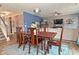 View of the open-concept living room flowing to the kitchen and stairway at 2075 Longford Ln, Avon, IN 46123