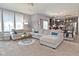 Open-concept living room flows into kitchen and dining area, perfect for entertaining at 2075 Longford Ln, Avon, IN 46123