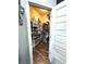 The walk-in pantry with shelving optimizes kitchen storage, blending convenience with organization at 2075 Longford Ln, Avon, IN 46123