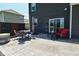 Backyard patio with a dining table, a hot tub, and an outdoor sofa at 2075 Longford Ln, Avon, IN 46123