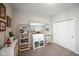Charming bedroom space with decorative shelves, a mounted television and a sliding door closet at 2250 Somerset Dr, Franklin, IN 46131