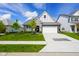 Charming two-story home with a two-car garage, manicured lawn, and beautiful landscaping at 2250 Somerset Dr, Franklin, IN 46131