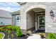 Charming front entrance featuring stone facade, manicured landscaping, and a welcoming front door at 2250 Somerset Dr, Franklin, IN 46131