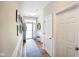 Inviting hallway with beautiful flooring, decorative molding, and ample natural light at 2250 Somerset Dr, Franklin, IN 46131
