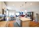 Open-concept kitchen featuring an island with seating, stainless steel appliances, and ample counter space at 2250 Somerset Dr, Franklin, IN 46131