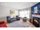 Bright living room featuring fireplace, hardwood floors and ample natural light at 2250 Somerset Dr, Franklin, IN 46131