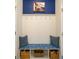 Cozy mudroom with a comfortable bench, storage baskets, and convenient coat hooks at 2250 Somerset Dr, Franklin, IN 46131