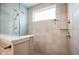 Modern shower with tiled walls, shower head, handheld sprayer, and a glass enclosure for a clean look at 2250 Somerset Dr, Franklin, IN 46131