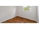 Bedroom featuring hardwood floors, a window and baseboard at 2263 N Rural St, Indianapolis, IN 46218