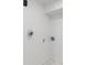 Minimalist laundry room with white walls and new flooring at 2263 N Rural St, Indianapolis, IN 46218