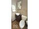 Charming half bathroom featuring modern sink and vanity at 2402 S Rybolt Ave, Indianapolis, IN 46241