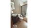The bathroom boasts tile surround, updated vanity, toilet, and walk-in shower at 2402 S Rybolt Ave, Indianapolis, IN 46241