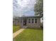 Charming brick home with manicured lawn and inviting entrance at 2402 S Rybolt Ave, Indianapolis, IN 46241